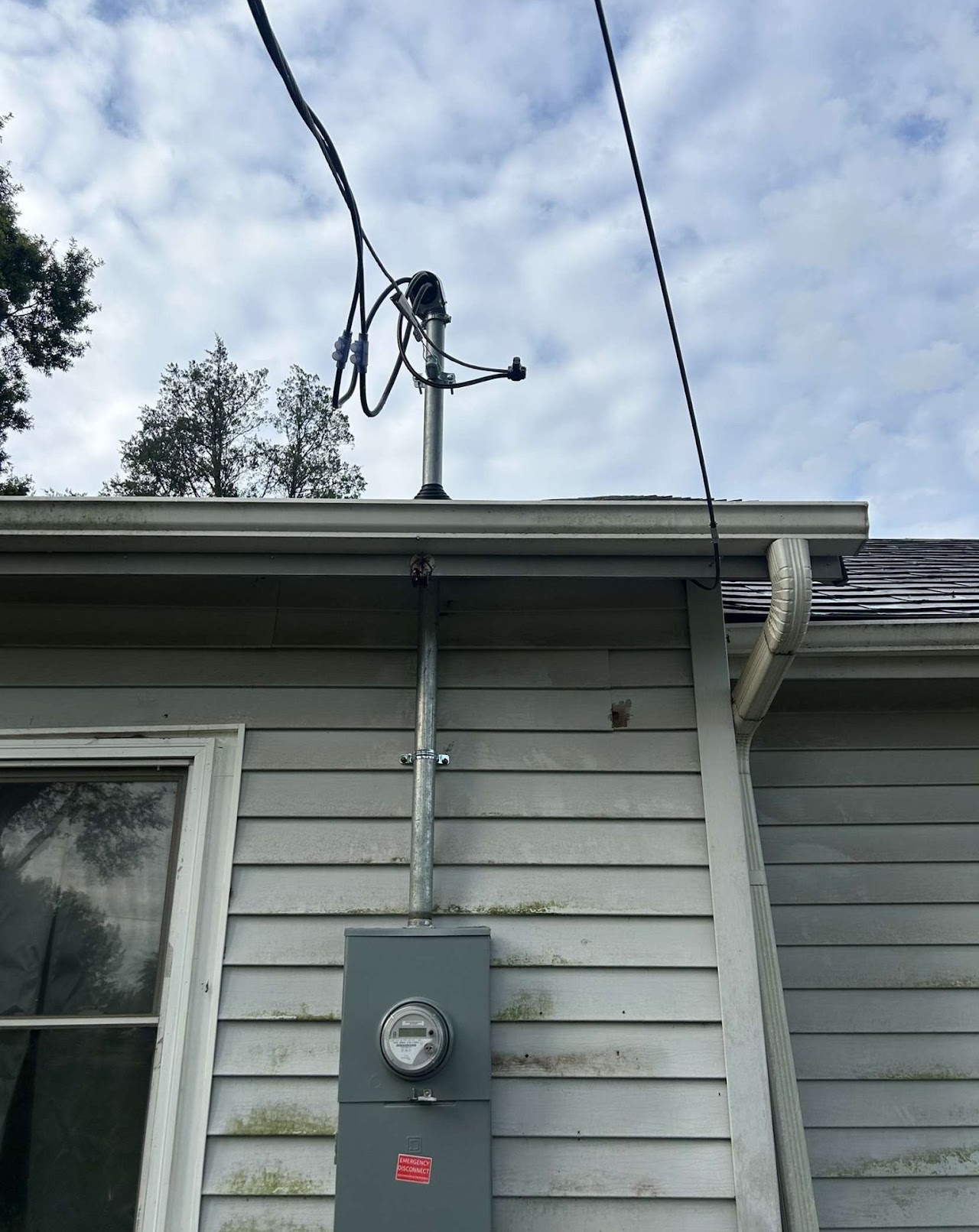 Outdoor electrical service entry on a single-family home