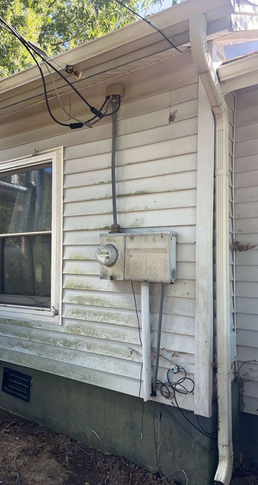 Older service entry awaiting upgrade — typical Circle One Electric scope